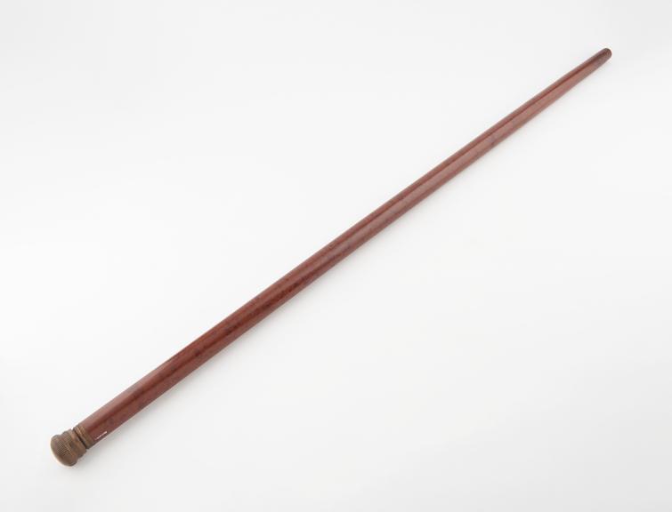 Physician's cane with copper knob handle containing glass phial