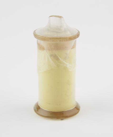 Glass specimen jar containing iodoform powder