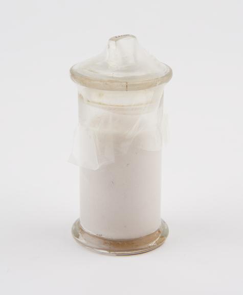 Glass specimen jar, containing salicylic acid