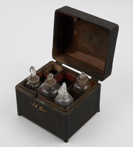 Medicine chest, fishskin covered, with four empty bottles, c1820