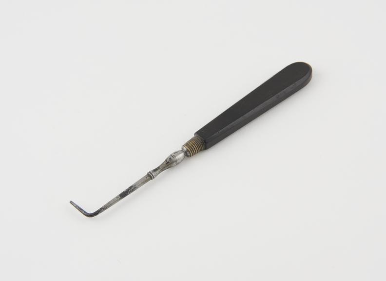 Dental stopper, steel with ebony handle, English, 1820-1870