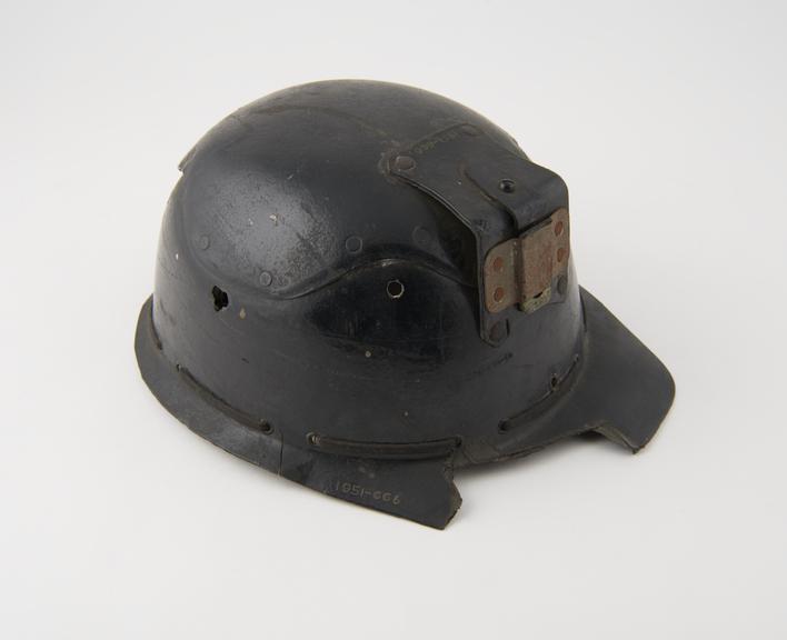 Miner's helmet, one of seven