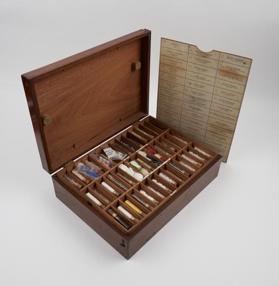 Flat mahogany chest containing over 100 compartments filled with specimens of materia medica