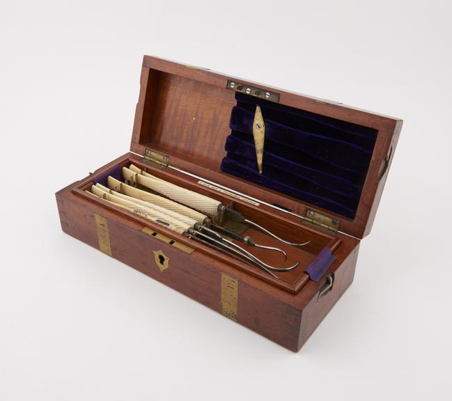 Set of surgical instruments, ivory handles and steel blades