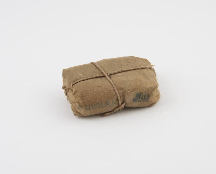 Bandage, wrapped in canvas