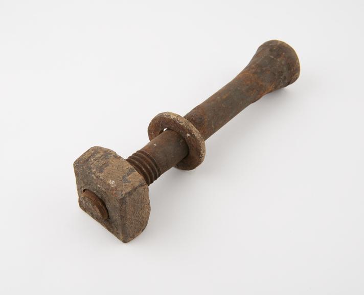 Bolt with nut, part of two bays of floor beams