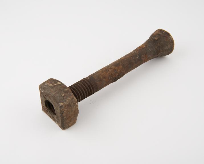 Bolt with nut, part of two bays of floor beams