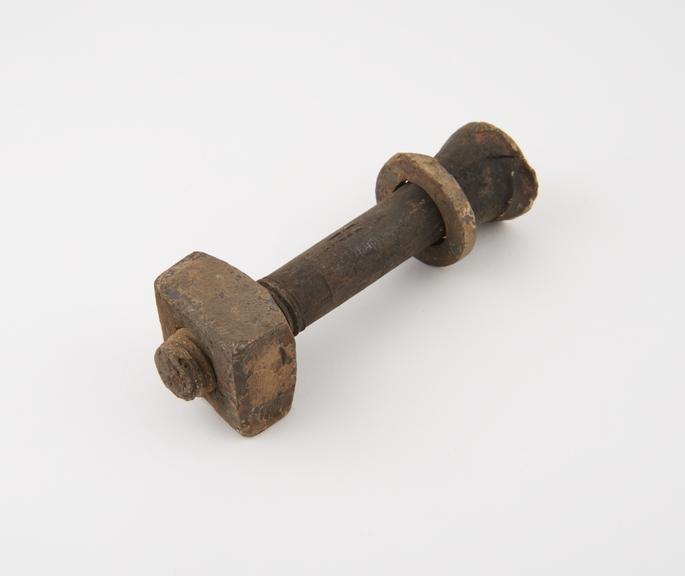 Bolt with nut, part of two bays of floor beams