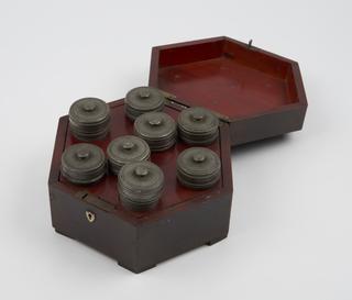 Eight pewter canisters