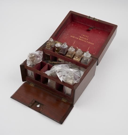 Medicine chest, hinged lid and front, by S