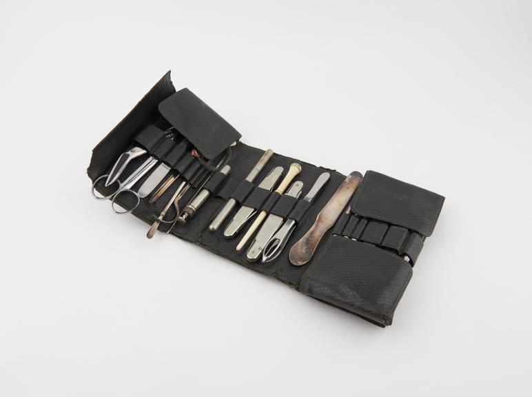 Pocket surgical instrument set in folding leather case