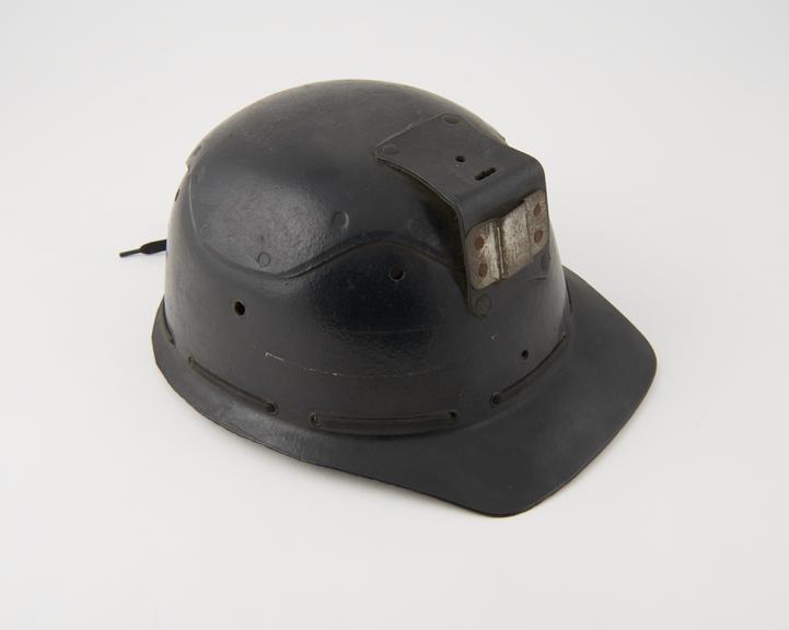 Miner's helmet, one of seven