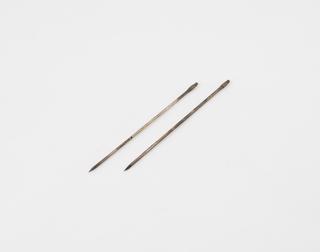 Two metal trocars