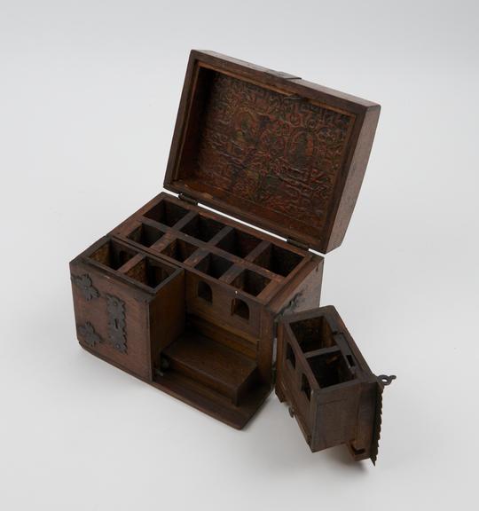 Small mahogany medicine chest with 2 hinged wing doors in front