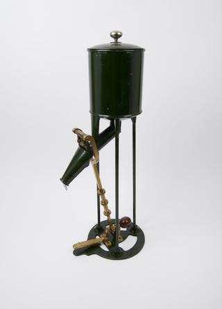 Cement testing machine, made of metal, a container at the top