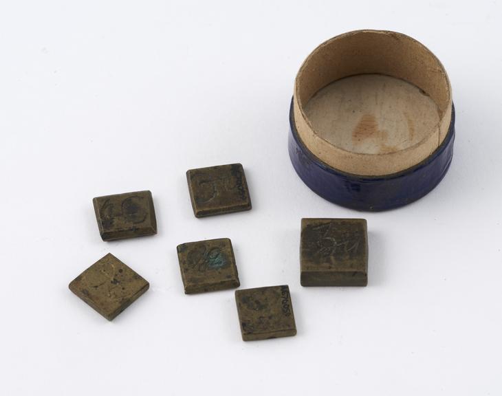 Set of 6 square brass weights