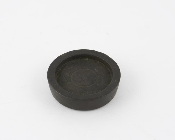 Circular English brass weight, 19th century