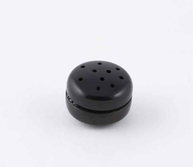 Small round ebony (?) box, perforated for inhalation