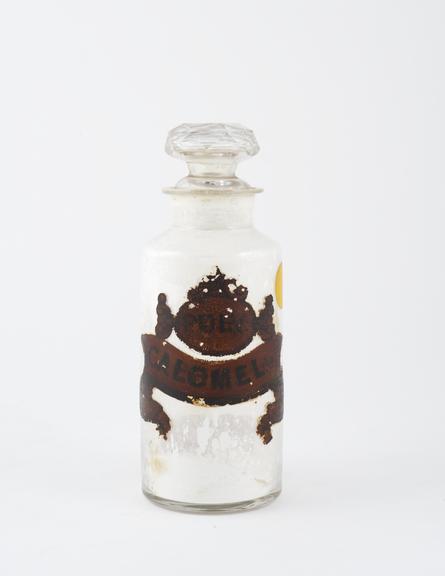 Bottle, clear glass, with contents, originally for calomel