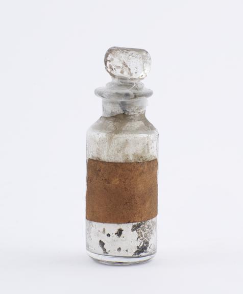 Small bottle, clear glass, trace content, English, 1840-1900