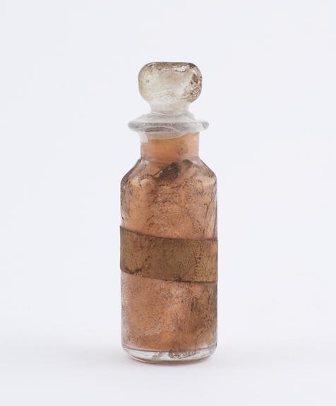 Small bottle, clear glass, trace content, English, 1840-1900