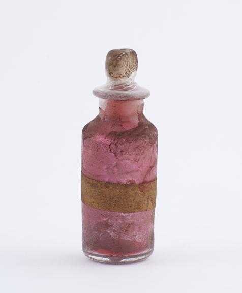 Small bottle, clear glass, trace content, English, 1840-1900