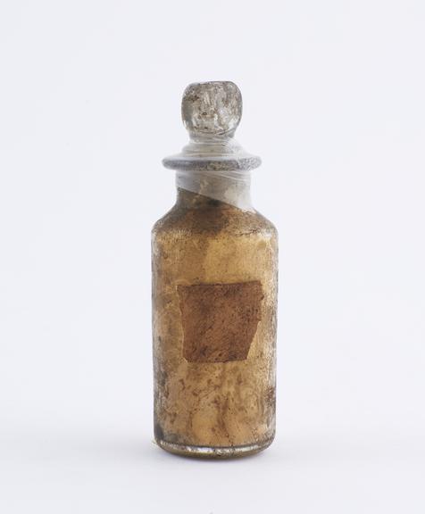 Small bottle, clear glass, trace content, English, 1840-1900