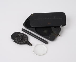 Case for Student's ophthalmoscope with four extra lenses, by G. Prescot, Irish