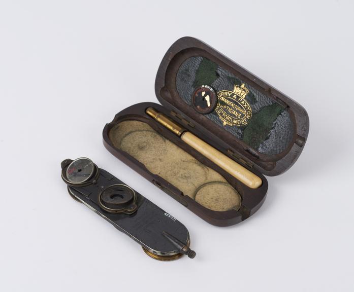 A Morton's ophthalmoscope in wooden case, personal relic of N