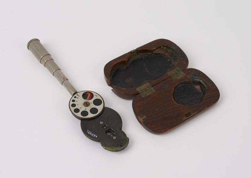 Harman's ophthalmoscope in wooden case