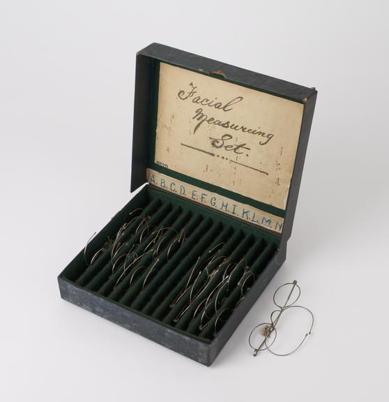 Box containing 12 nickel plated spectacle frames