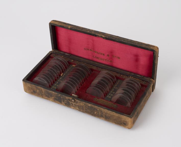 Set of 19 pairs of trial lenses, in leather case