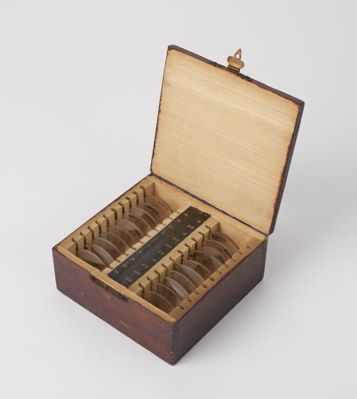 Set of 20 trial lenses, in wooden case, English, 1890-1930