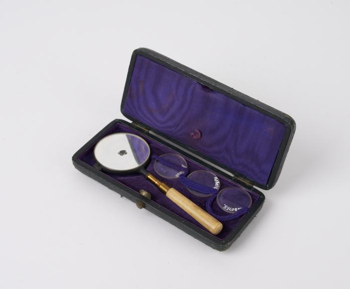 Liebreichs type ophthalmoscope with 6 lenses in a leather