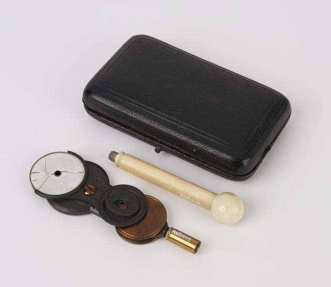 Ophthalmoscope, with bare handle in black leather covered case