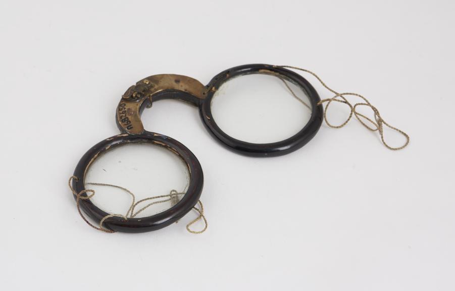 Folding spectacles, repaired, wood and brass, with cords