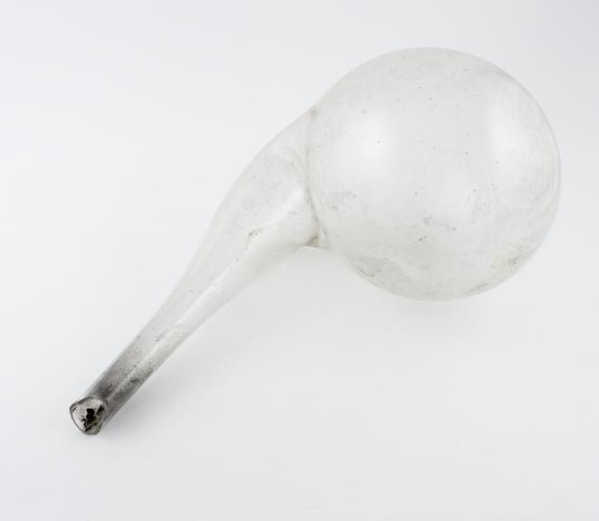 Large clear glass retort, swan necked, globous flask