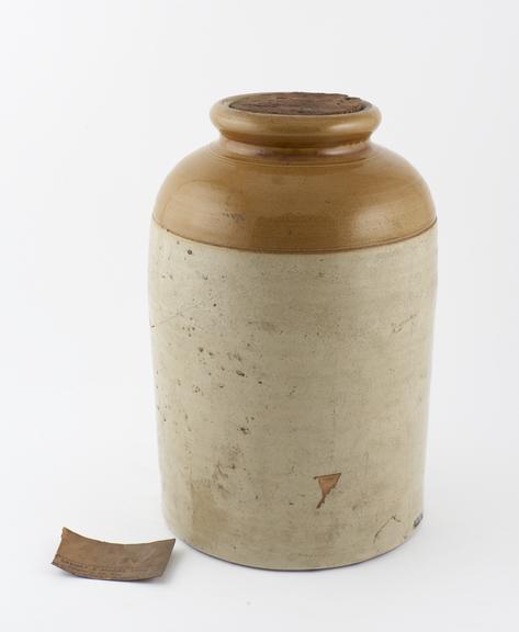 Plain cylindrical English earthenware jar formerly used for