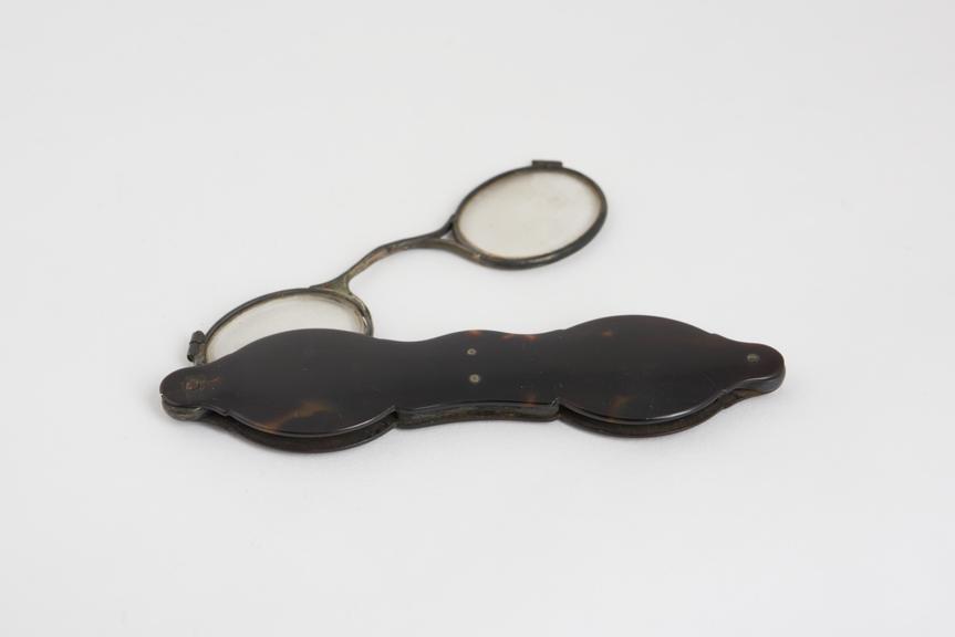 Hand, folding spectacles, tortoiseshell and silver, European