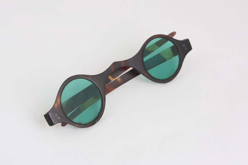 Spectacles, straight, tinted, tortoiseshell, silver hinges