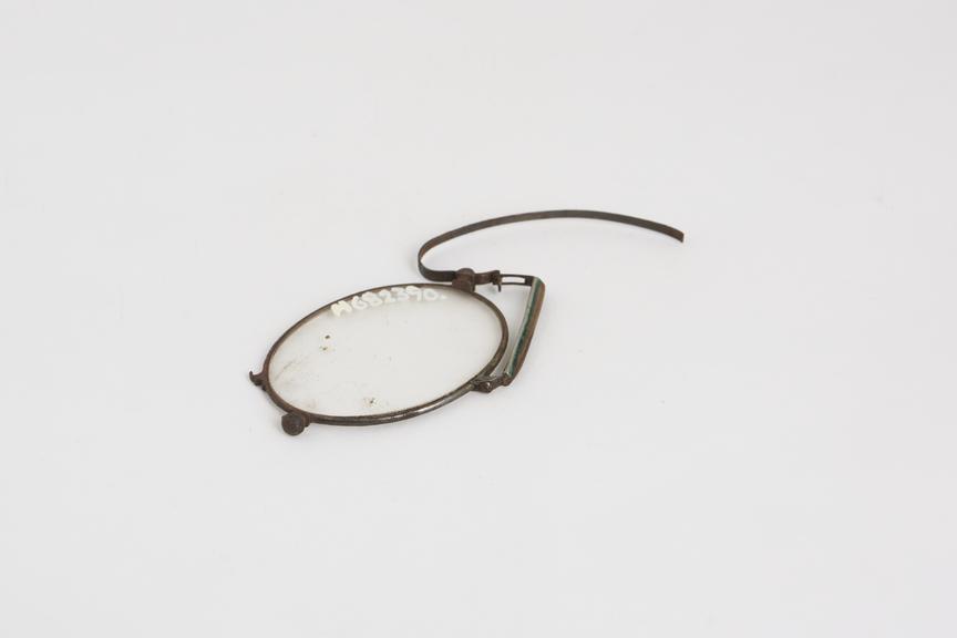 Pince nez, folding spectacles (part only), metal, English