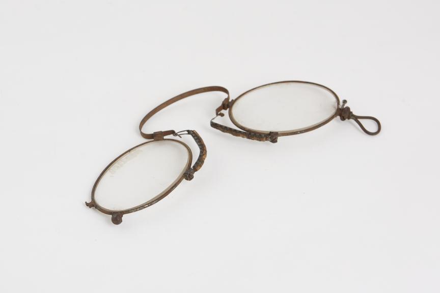 Pince nez, folding spectacles, metal and cork, English