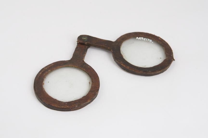 Copy of 17th century folding spectacles, leather covered