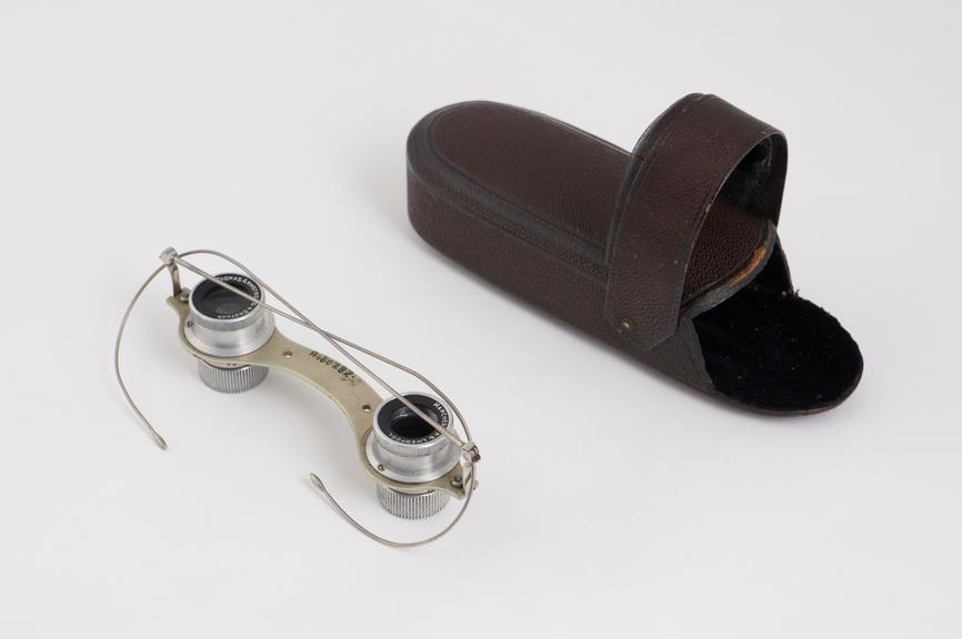 Opera glasses, coil spring, nickel plated, wire and vulcanite