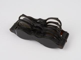 Eight sets of sight testing spectacles in horn(?)