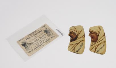 paper packet for enamelled metal optical novelty; packet bears instructions for 'Die 2 Sultane'