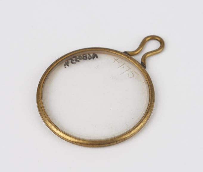 Trial lens in brass ring-mount with loop handle