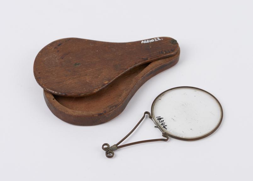 Magnifying glass, weak lens with copper wire frame