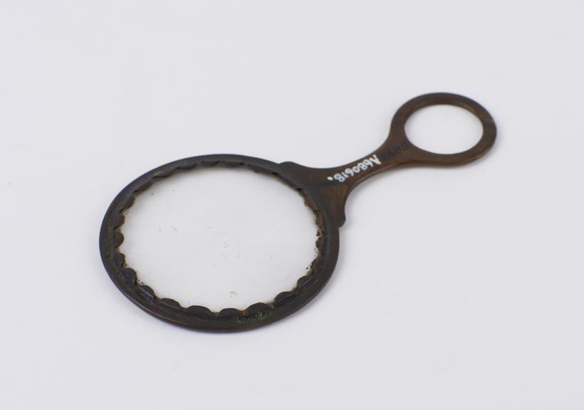 Magnifying glass, brass mounted, probably English, 1701-1800