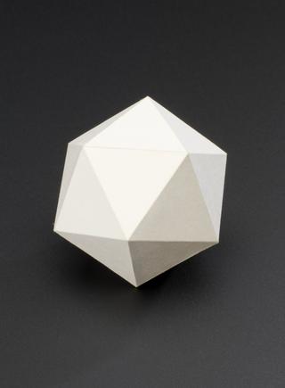 Polyhedron model showing the icosahedron and one of its 58 stellations